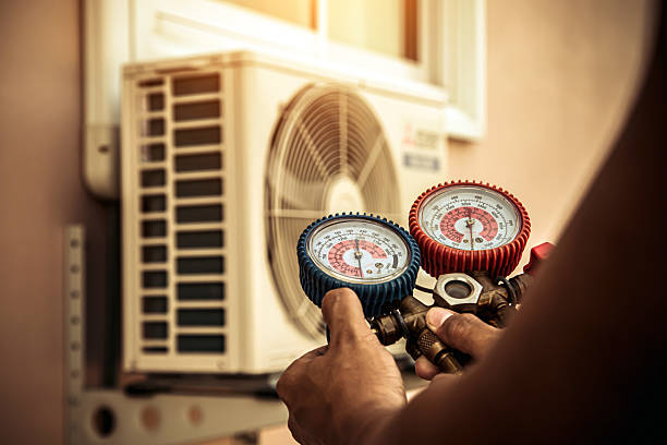 Professional Hvac technician working in Raymondville, TX